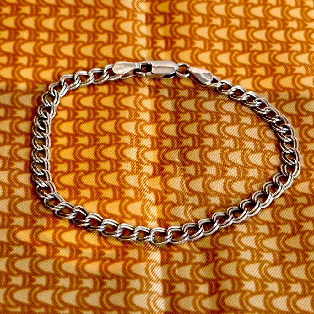 .925 STERLING SILVER CHARM BRACELET